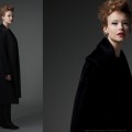 vrouwelijk model met zwarte jas